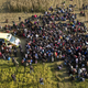 Image for article titled Photos: Hero Slovenian waiter delivers pizza to hungry migrant kids
